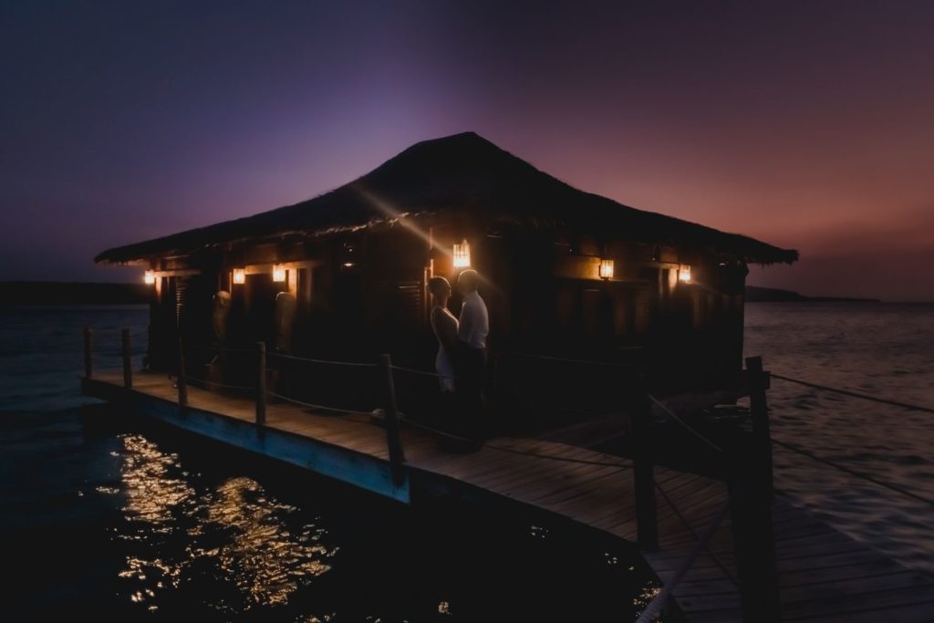 couple standing in the sunset during their destination wedding in Vanuatu