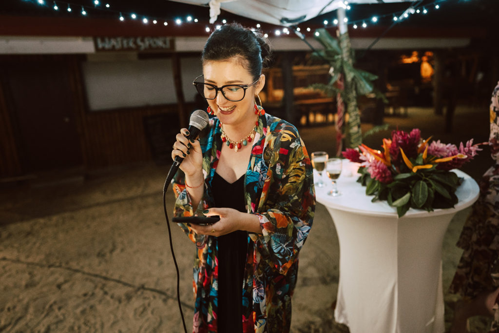 Guest giving a speech during wedding reception on Erakor Island